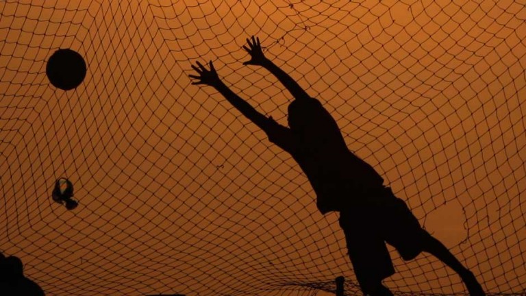 Boy playing football